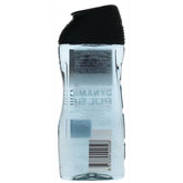A clear 250ml plastic bottle with a black flip-top cap is shown from the back, featuring a barcode and mirrored label text for Adidas - Dynamic Pulse Shower Gel.